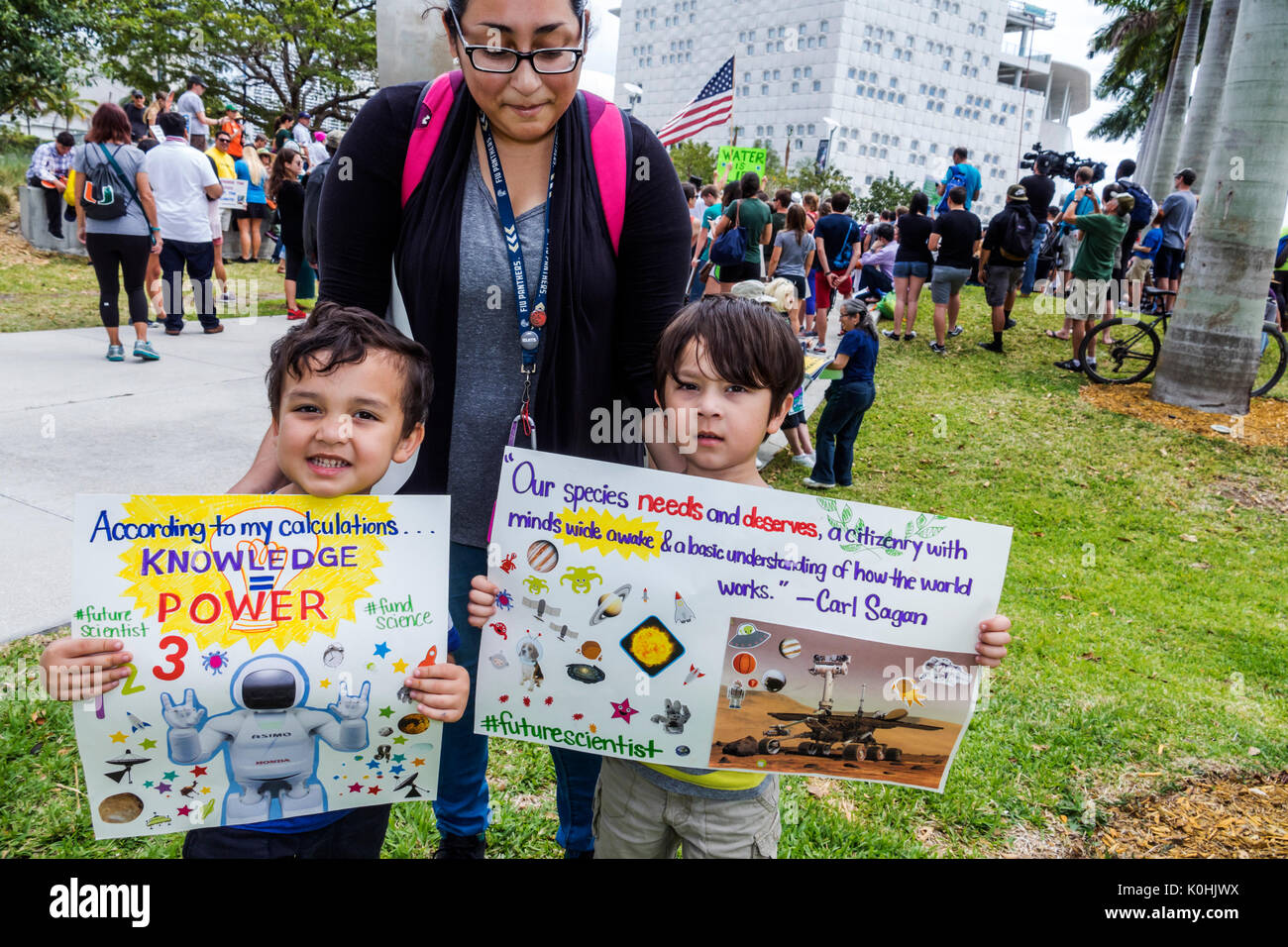 Miami Florida,Museum Park,March for Science,protest,rally,sign,poster,protester,Hispanic woman female women,boy boys,male kid kids child children youn Stock Photo