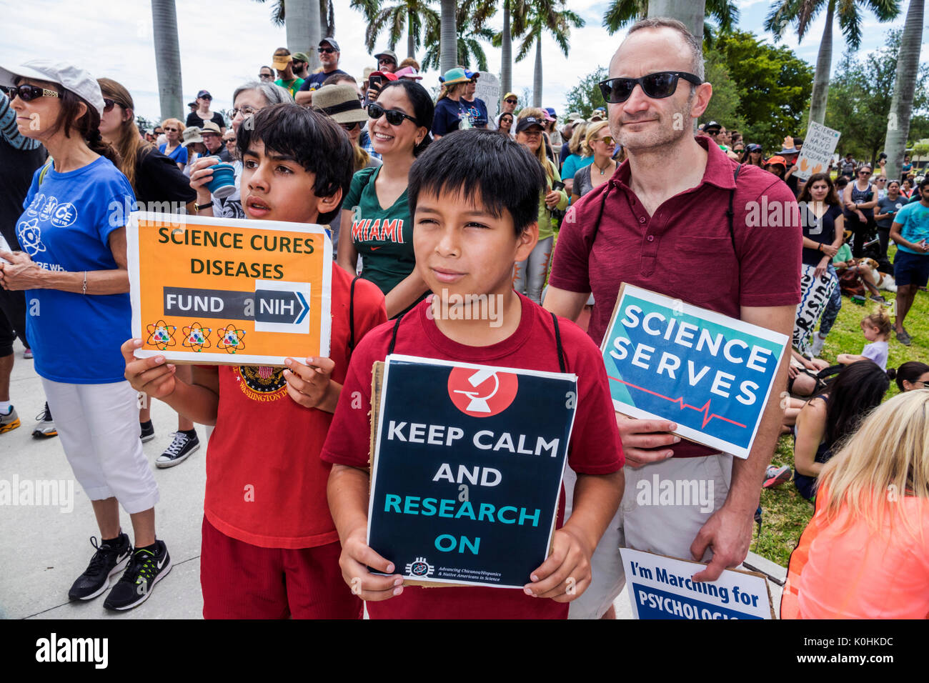 Miami Florida,Museum Park,March for Science,protest,rally,sign,poster,protester,boy boys,male kid kids child children youngster,Asian Hispanic Latinos Stock Photo