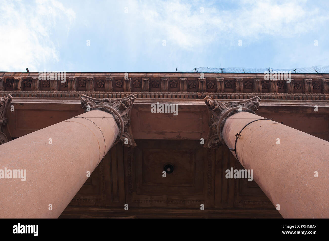 Architectural columns on the sky background Stock Photo