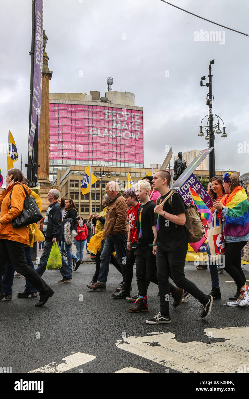 Thousands take to the streets in the Gay Pride parade through the heart of Glasgow's city centre. Hundreds of businesses and social groups show their Stock Photo