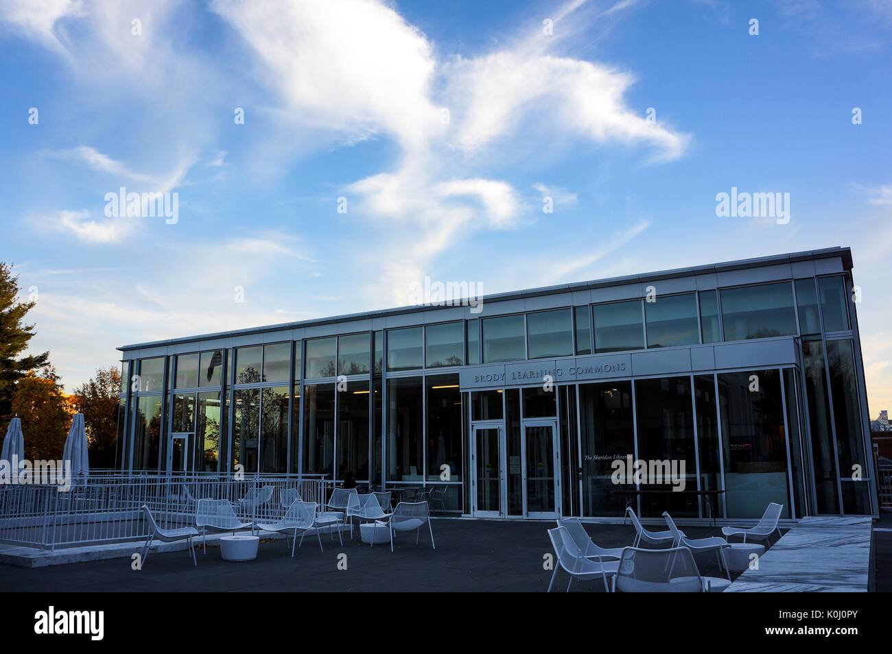 A shot of the patio, seating area, and cafe entrance to the Brody Learning Commons, a library and study space on the Homewood campus of the Johns Hopkins University in Baltimore, Maryland, 2015. Courtesy Eric Chen. Stock Photo