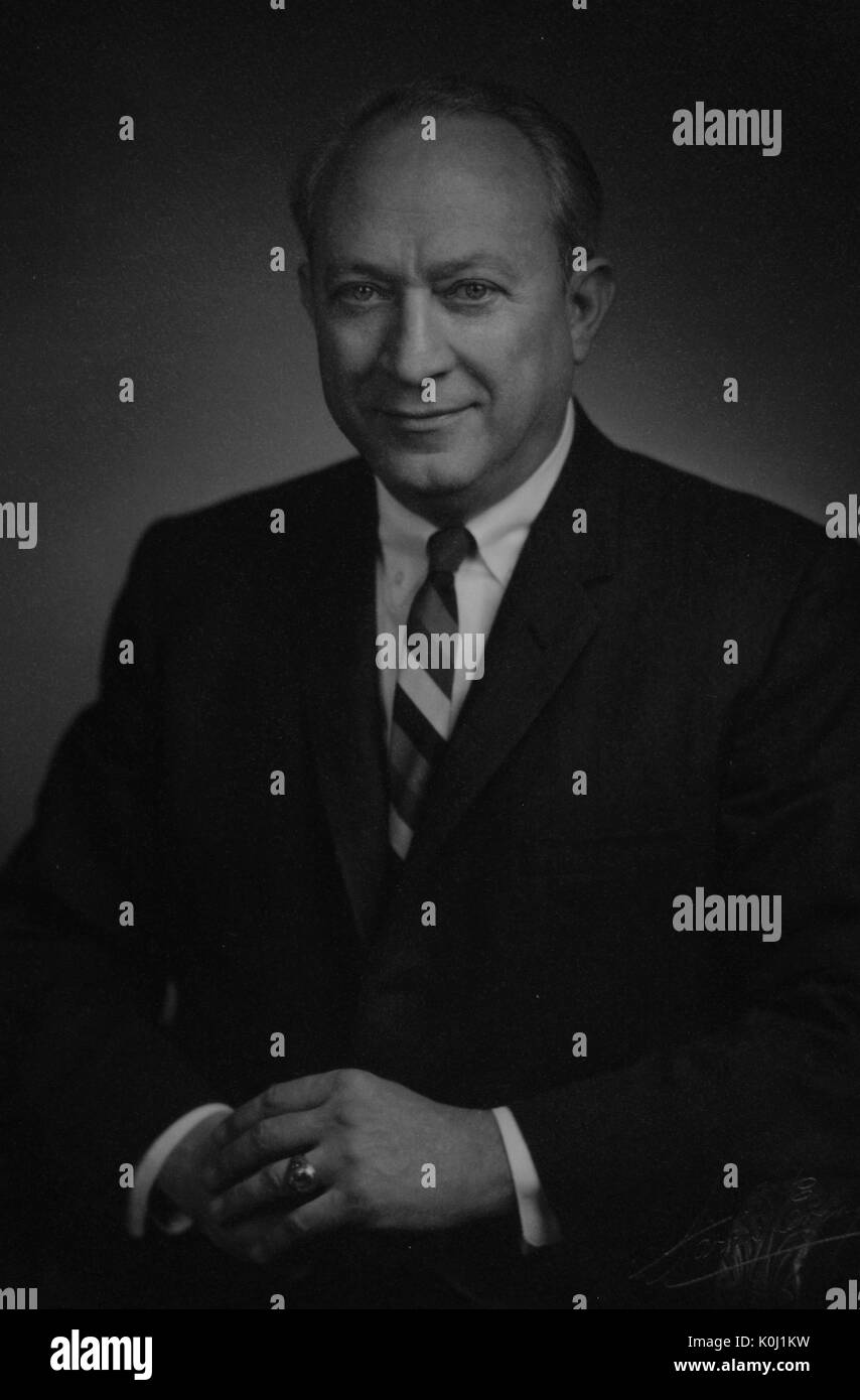 Seated half length photographic portrait of Benjamin Theodore Rome, a Johns Hopkins University graduate who transformed the George Hyman Construction Company into an extremely successful national firm, and after whom a deanship at the university is named. 1950. Stock Photo