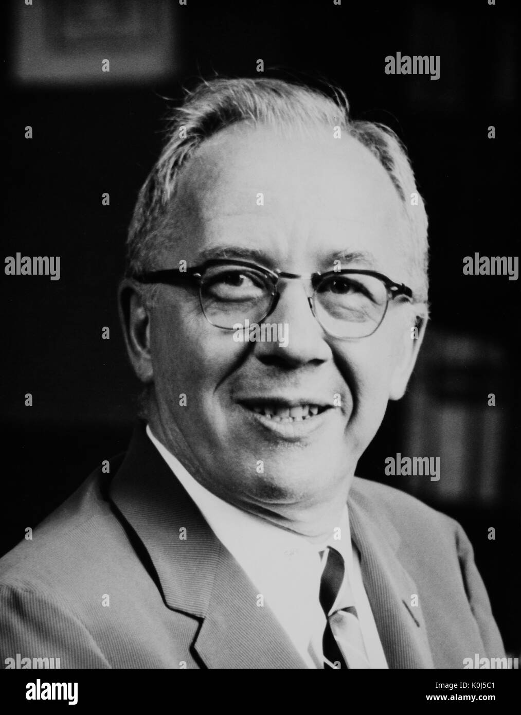 Seated headshot portrait of Don Cameron Allen, a professor of English literature at The Johns Hopkins University. 1963. Stock Photo