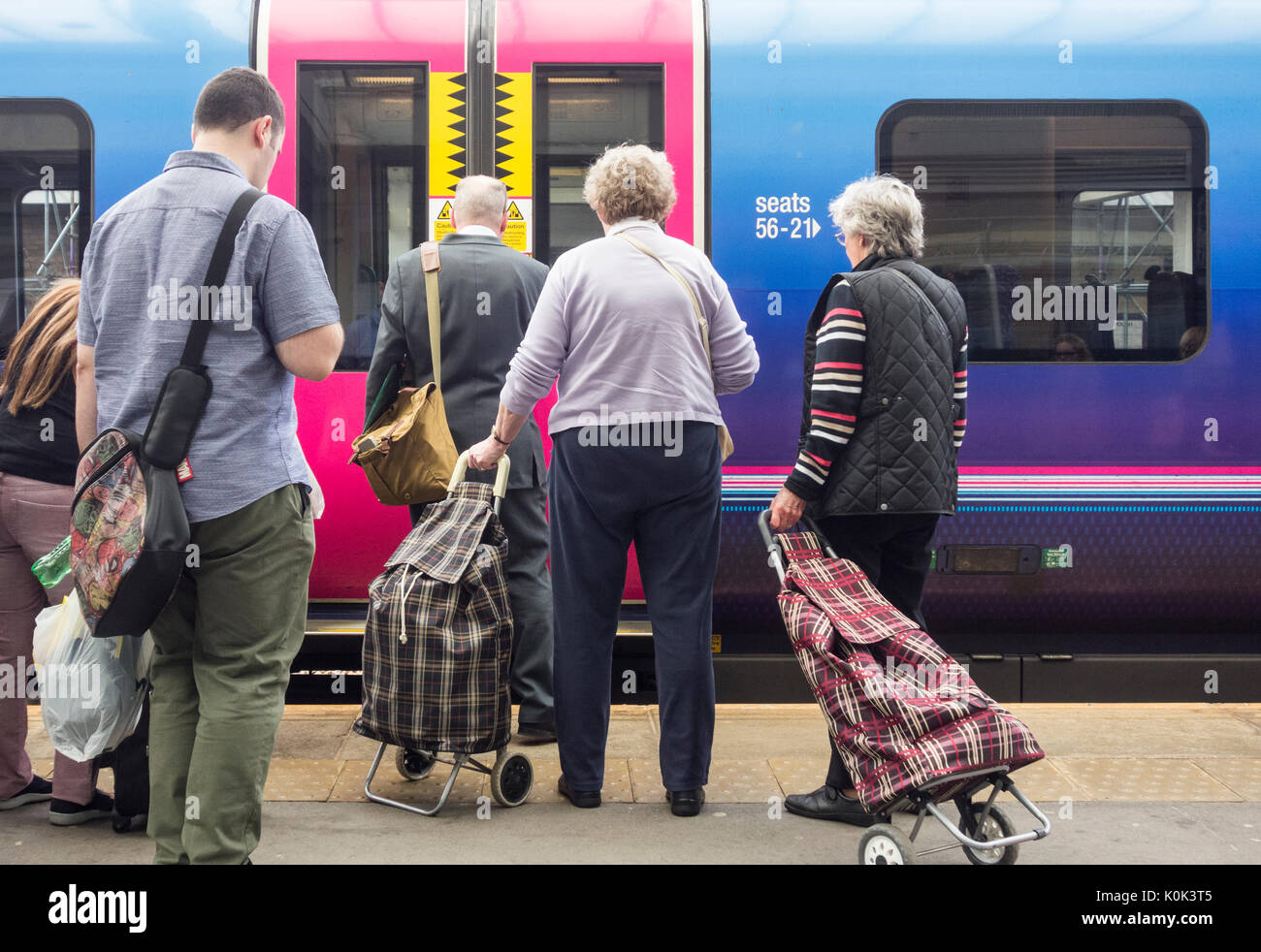 People boarding Transpennine express train at Middlesbrough station. UK Stock Photo