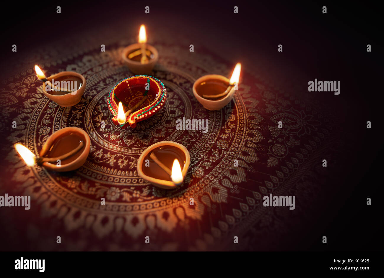 Happy Diwali - Diya lamps lit during diwali celebration Stock ...