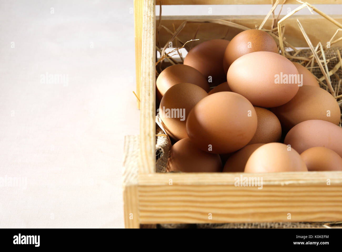 Eggs in wooden box. Stock Photo