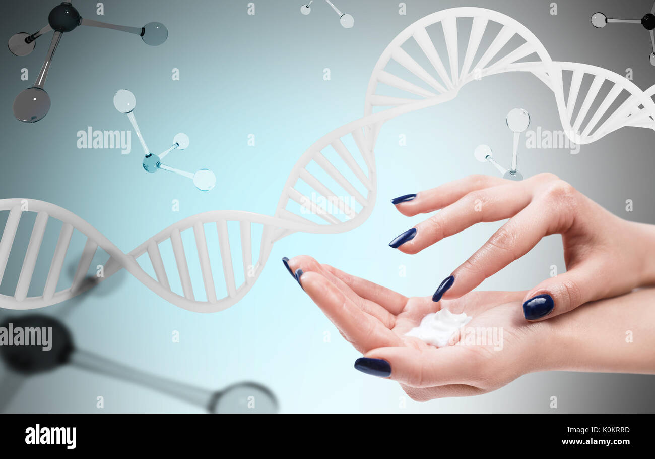 Female hands with cream over dna and molecules Stock Photo - Alamy