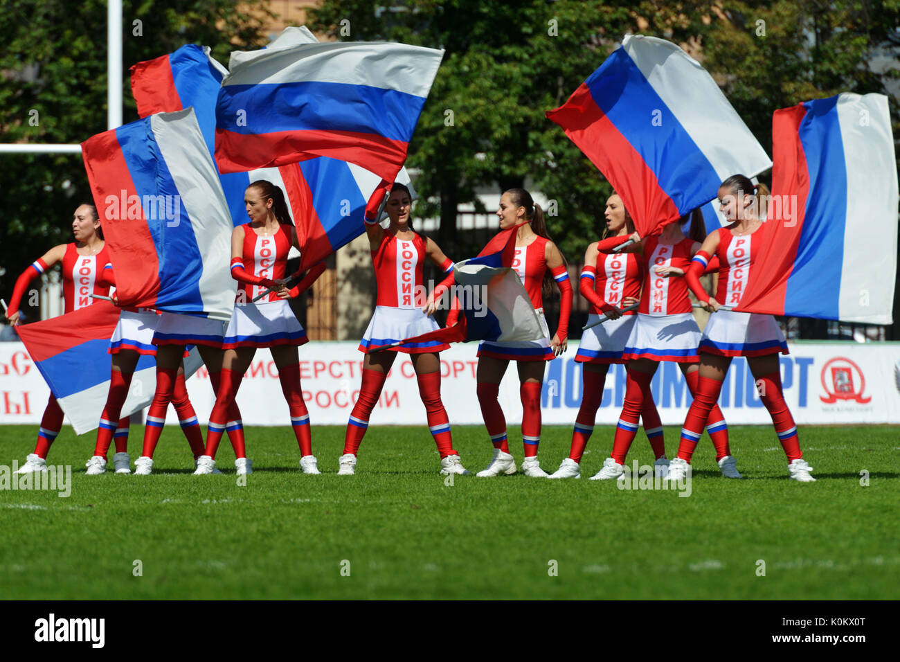 Moscow, Russia - June 29, 2014: Russian girls with Russian flags supports the team Russia before the match for place 5 with Wales Stock Photo