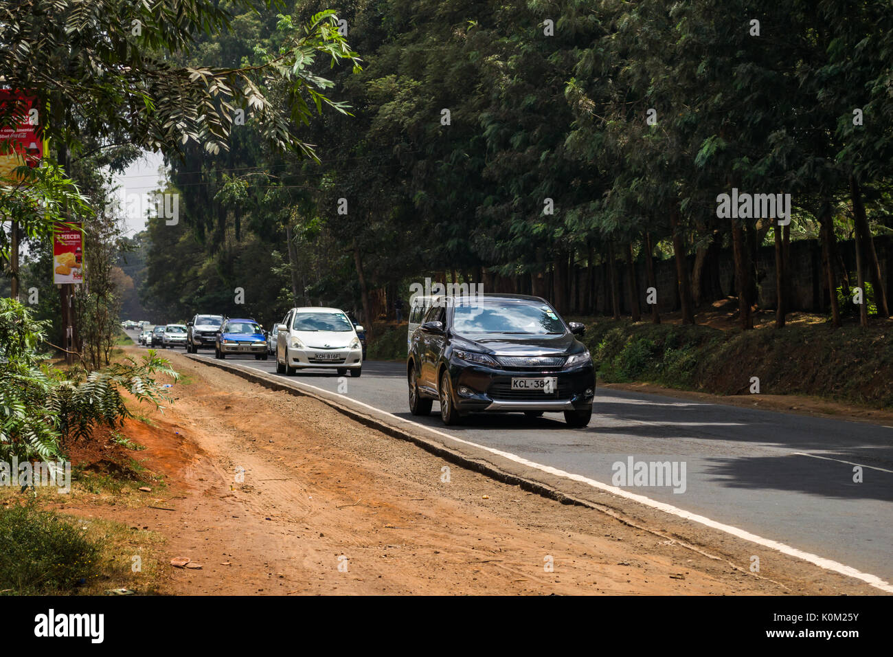 Vehicles driving on Waiyaki Way towards Nairobi, Kenya Stock Photo