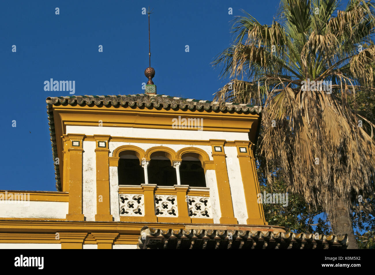 the alleys and the palaces of the Barrio de Santa Cruz, the primary tourist neighborhood of Seville and the former Jewish quarter of the medieval city Stock Photo