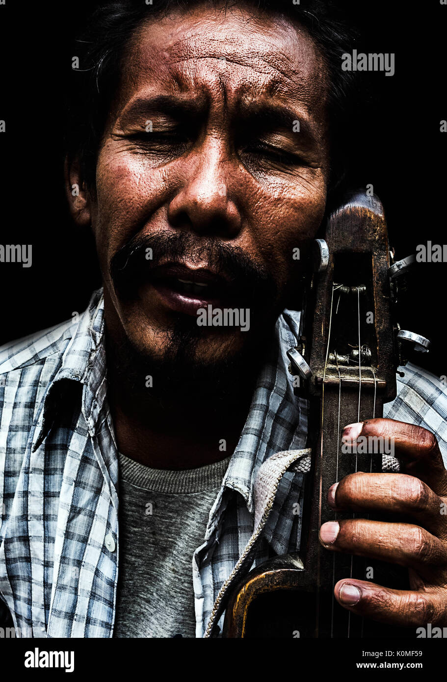 man playing violin, jaigaon, west Bengal, India, Asia Stock Photo Alamy