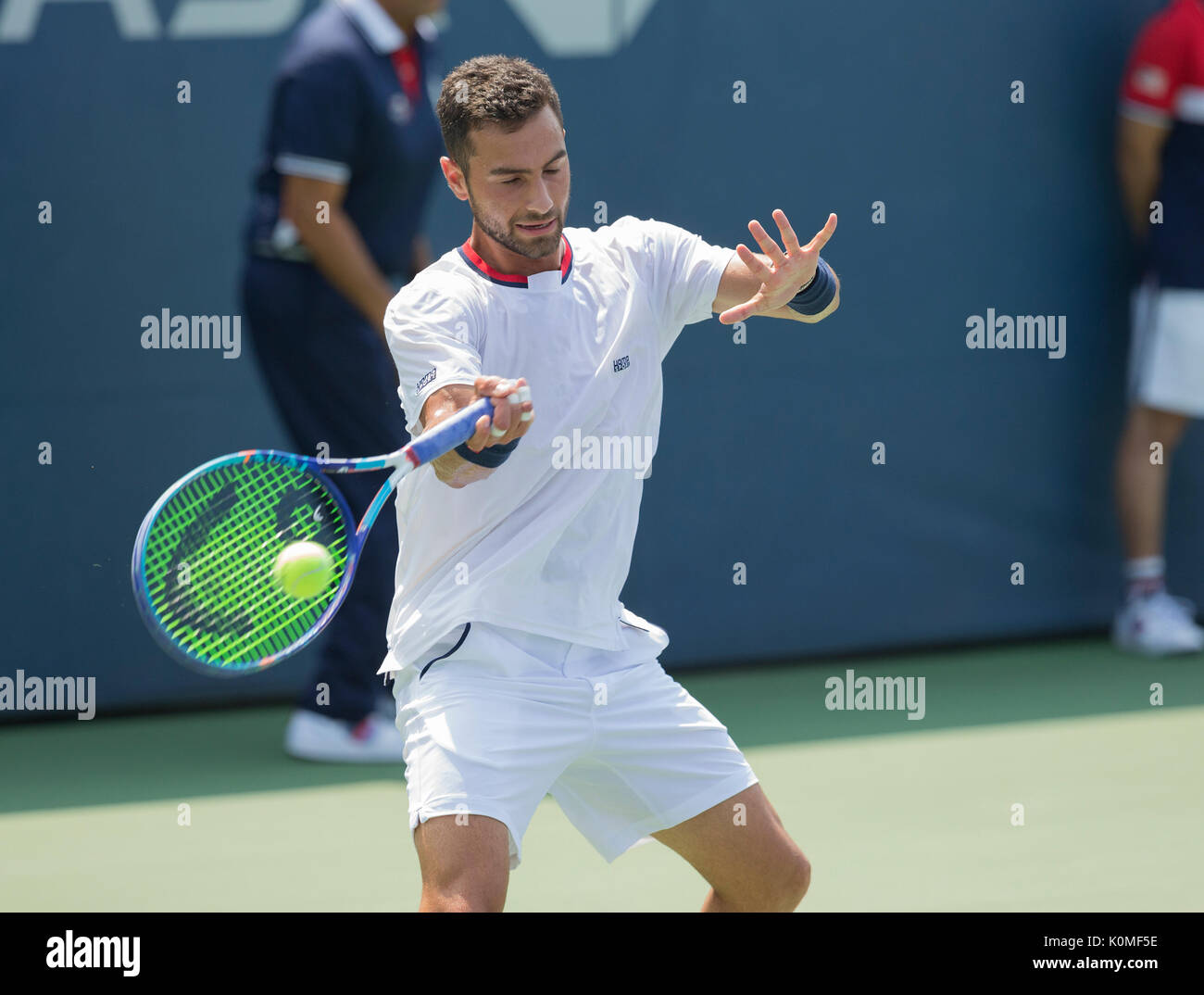 New York, United States. 22nd Aug, 2017. Noah Rubin of USA returns ball during qualifying game against Tobias Kamke of Germany at US Open 2017 Credit: Lev Radin/Pacific Press/Alamy Live News Stock Photo