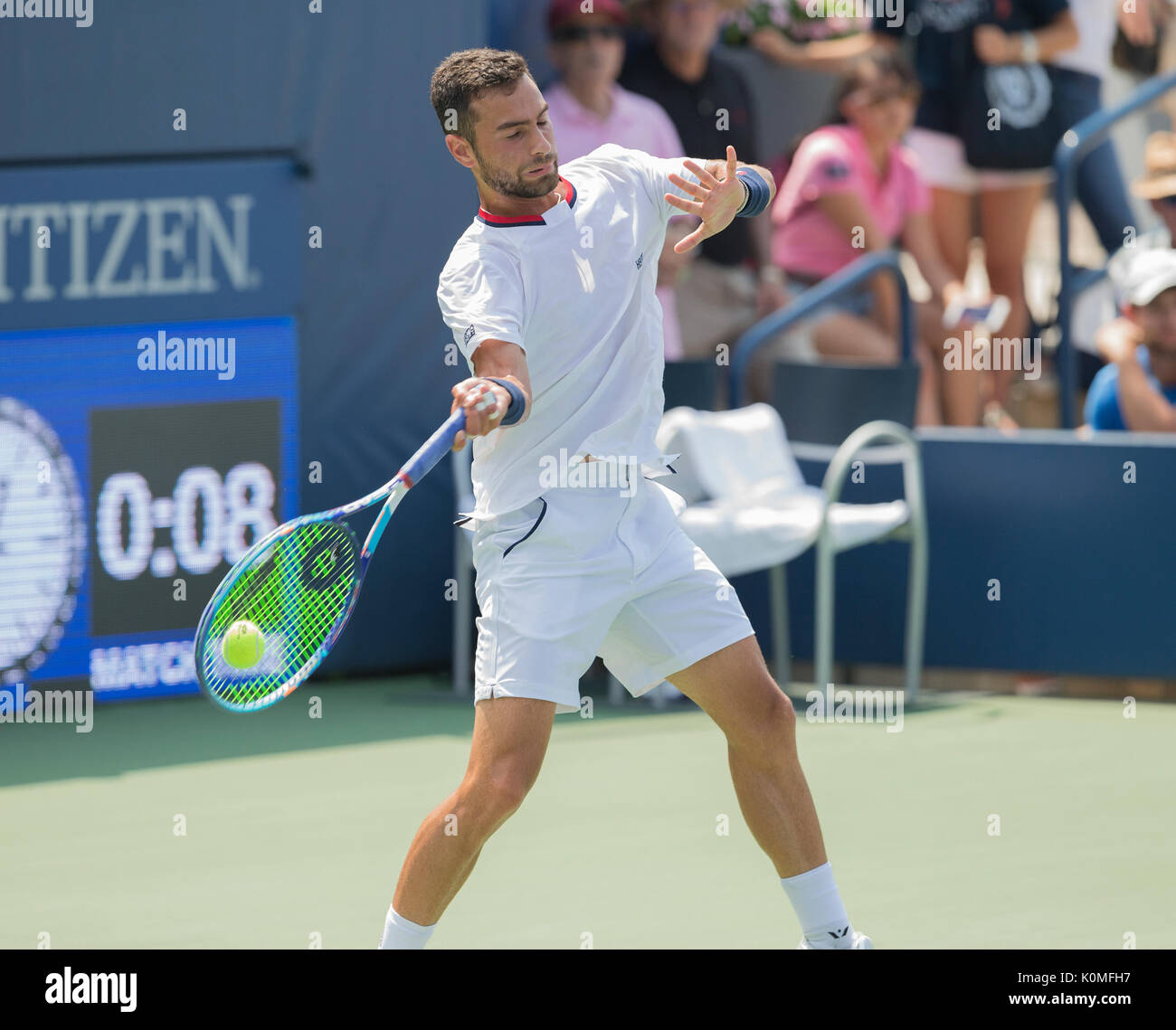 New York, United States. 22nd Aug, 2017. Noah Rubin of USA returns ball during qualifying game against Tobias Kamke of Germany at US Open 2017 Credit: Lev Radin/Pacific Press/Alamy Live News Stock Photo