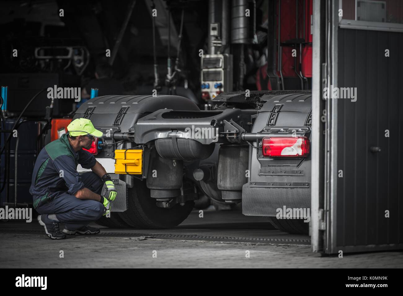 Mechanic repairing tractor hires stock photography and images Alamy
