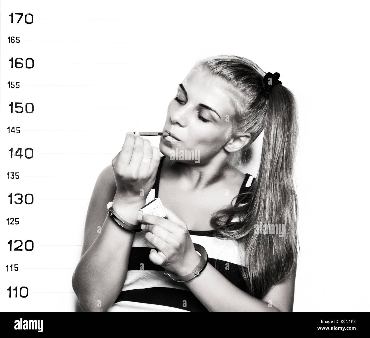 Young beautiful blonde woman with sigarette, Criminal Mug Shots. black ...