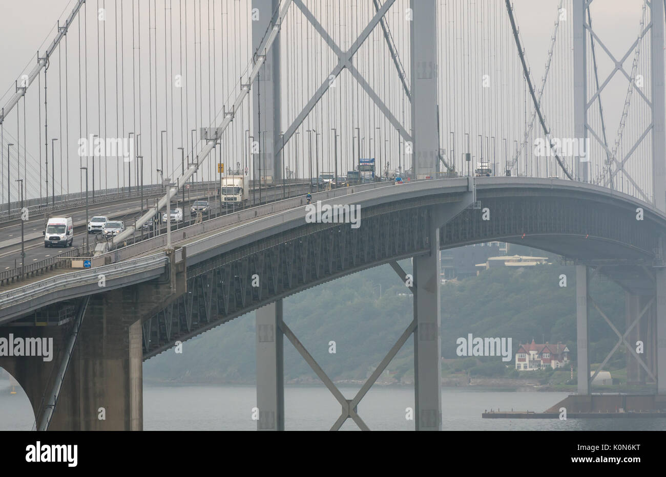 Foggy view of rush hour traffic on the Forth Road Bridge, shortly before the opening of the new bridge, Queensferry crossing, South Queensferry, Scotland, UK Stock Photo