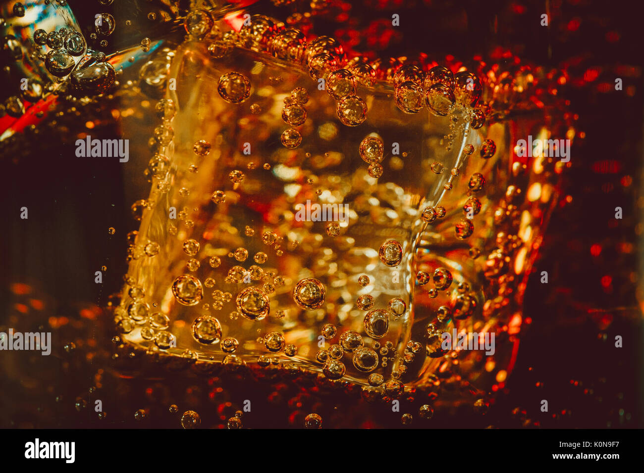 Beautiful cola with ice cubes close up in glass. Shallow DOF Stock ...