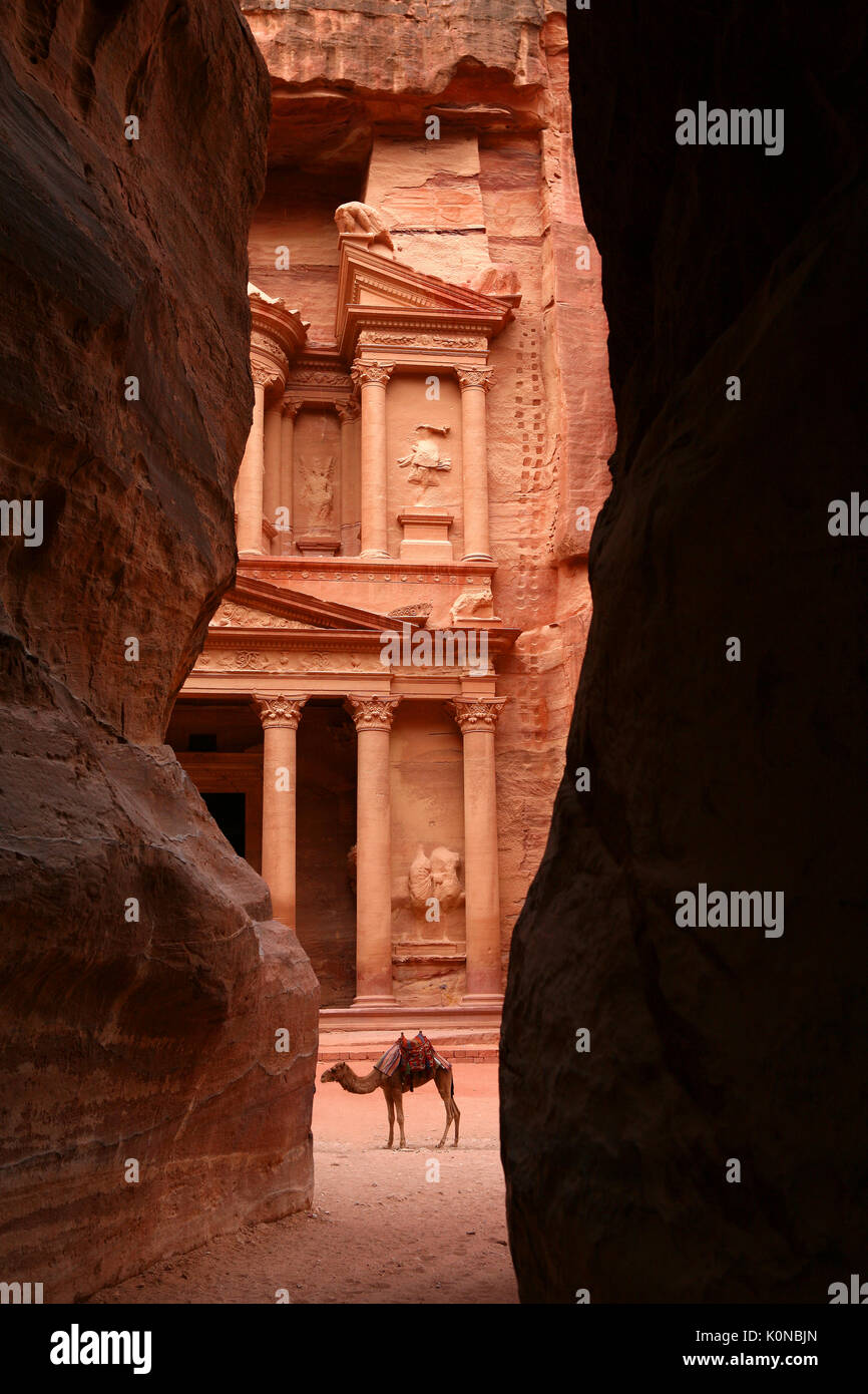 A glimpse of Al Khazneh, the Treasury, from the Siq, Petra, Jordan Stock Photo