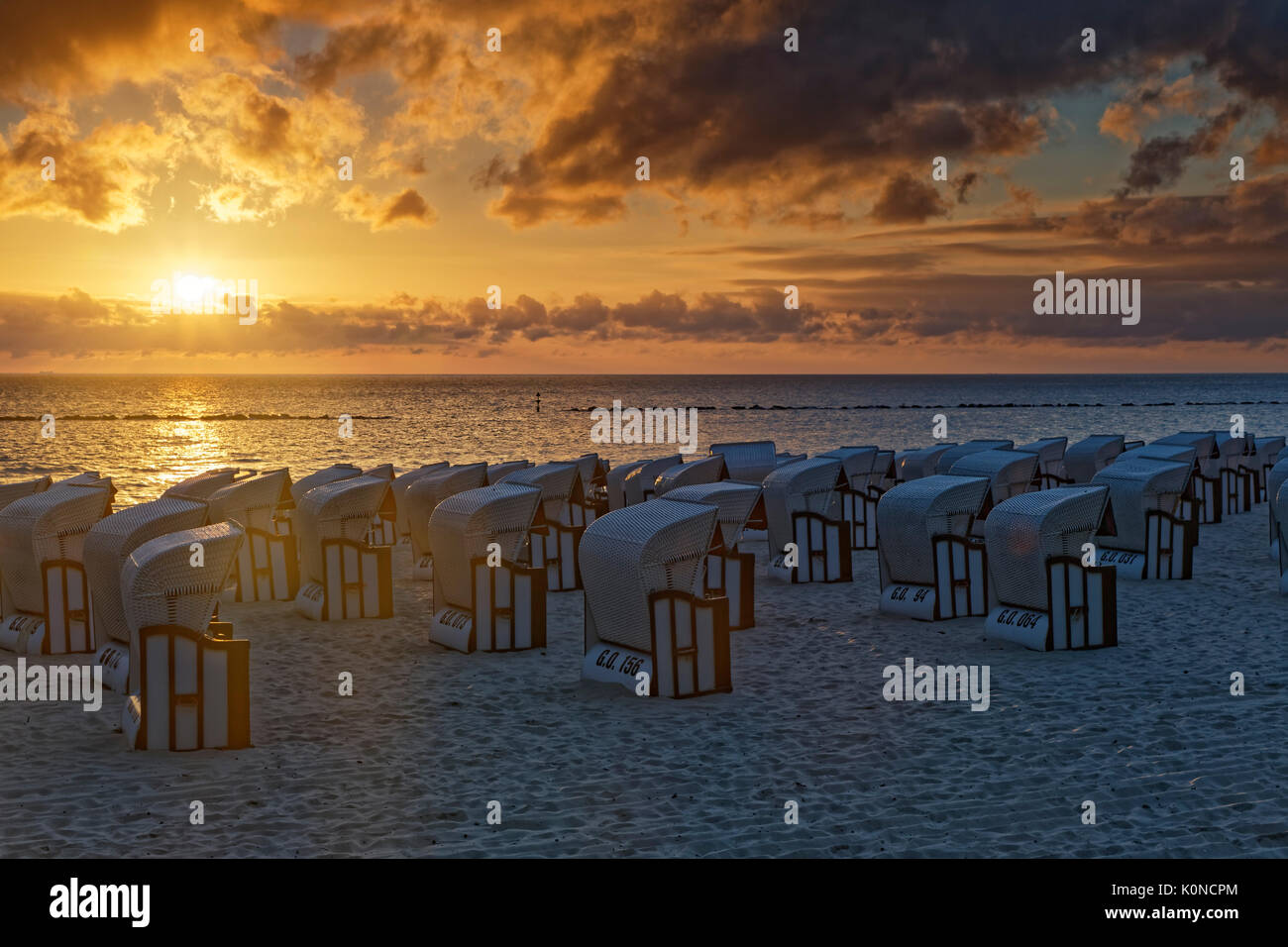 Germany, Mecklenburg-Western Pomerania, Baltic sea seaside resort Sellin, Hooded beach chairs on the beach Stock Photo