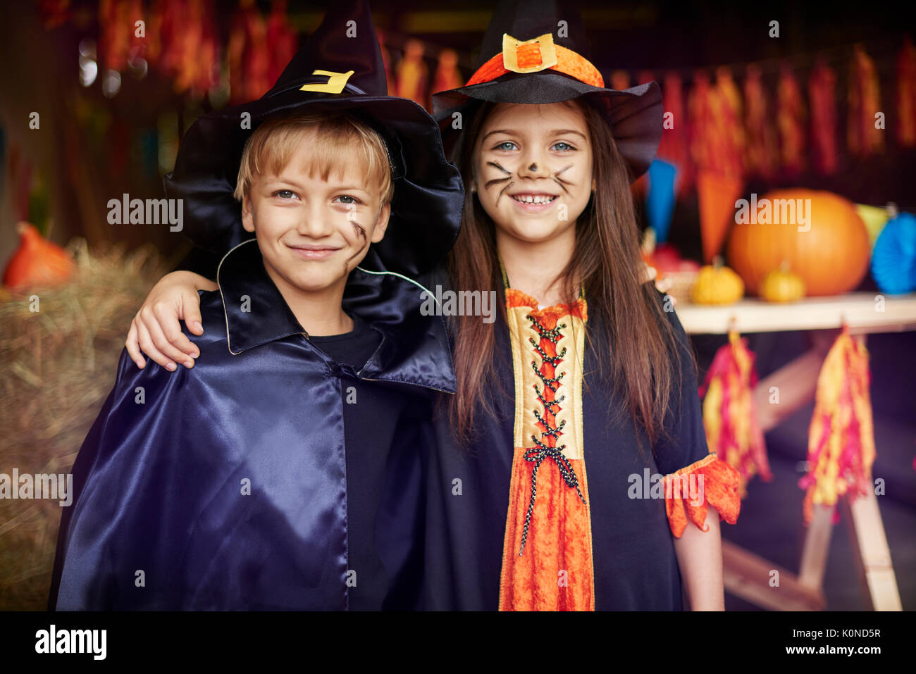 They aren't similar but they are siblings Stock Photo