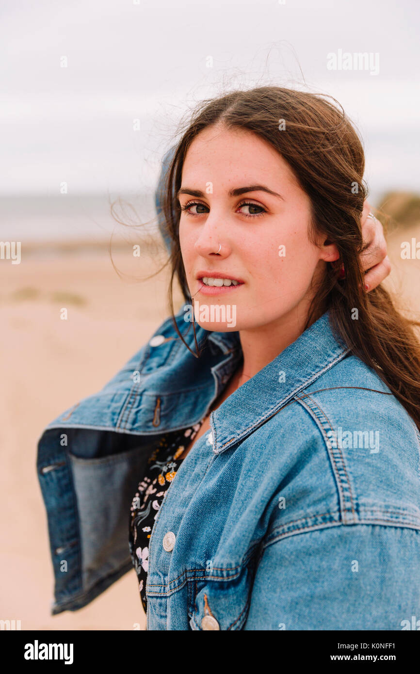 Portrait of young woman on the beach Stock Photo
