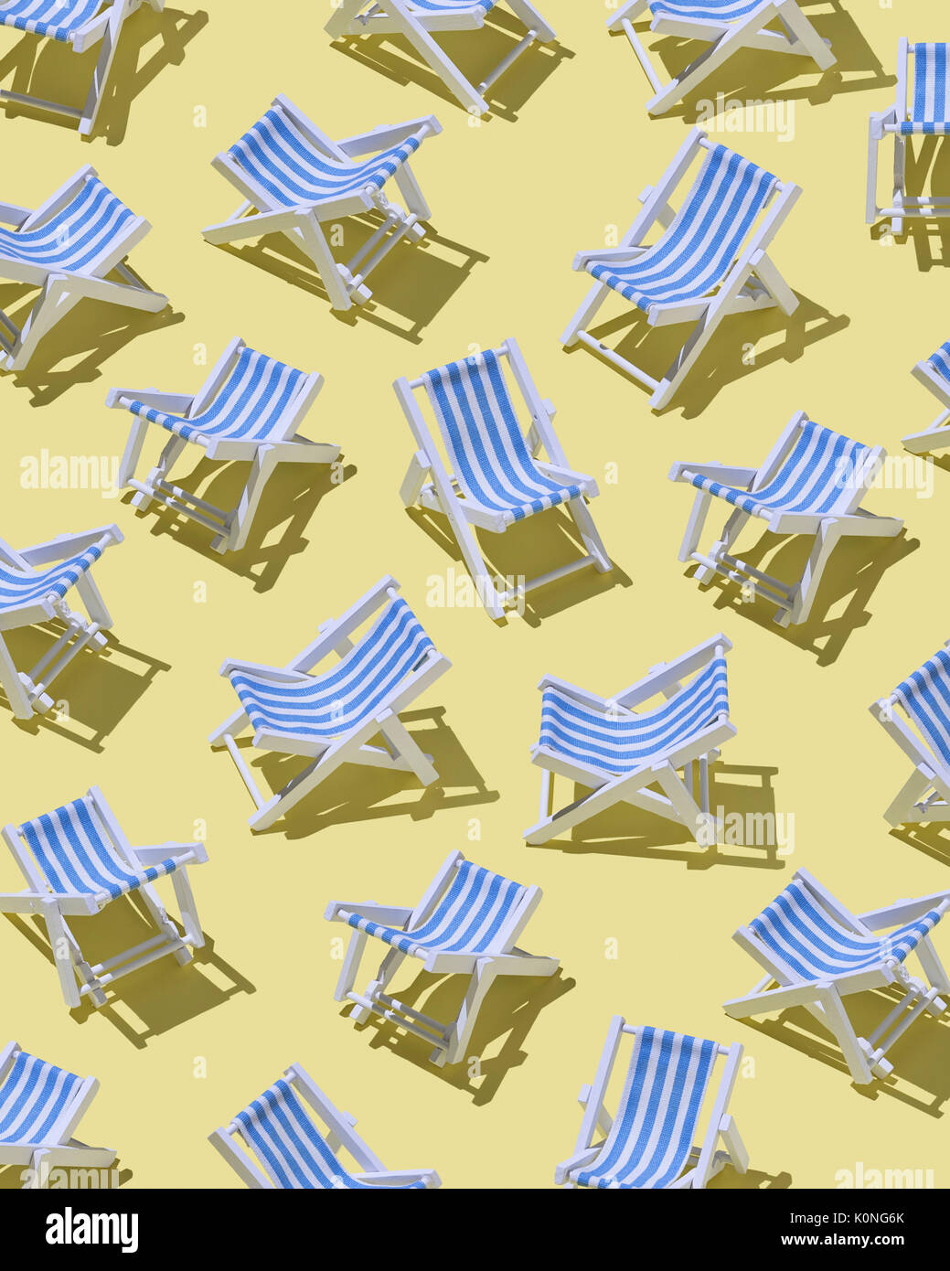 Beach chairs on yellow ground, 3D Rendering Stock Photo