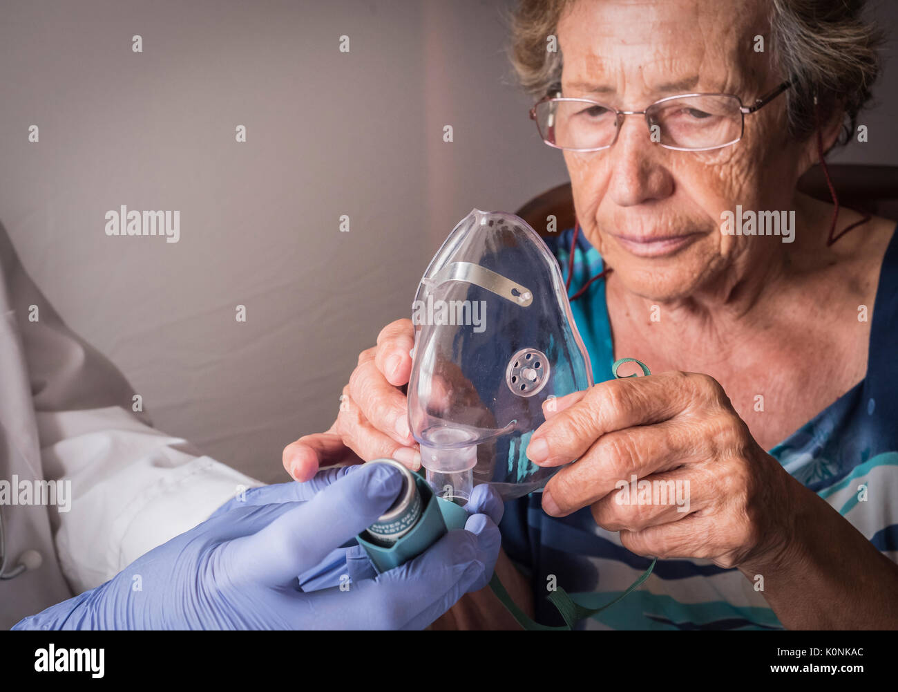 Advanced Inhalation Rituals Doctor explains to old woman how ventimask inhalation training works ...
