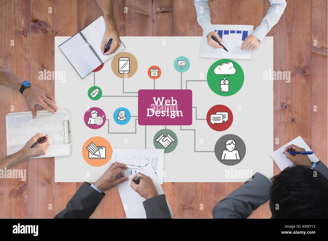 Digital composite of Table top meeting with web graphics Stock Photo Alamy