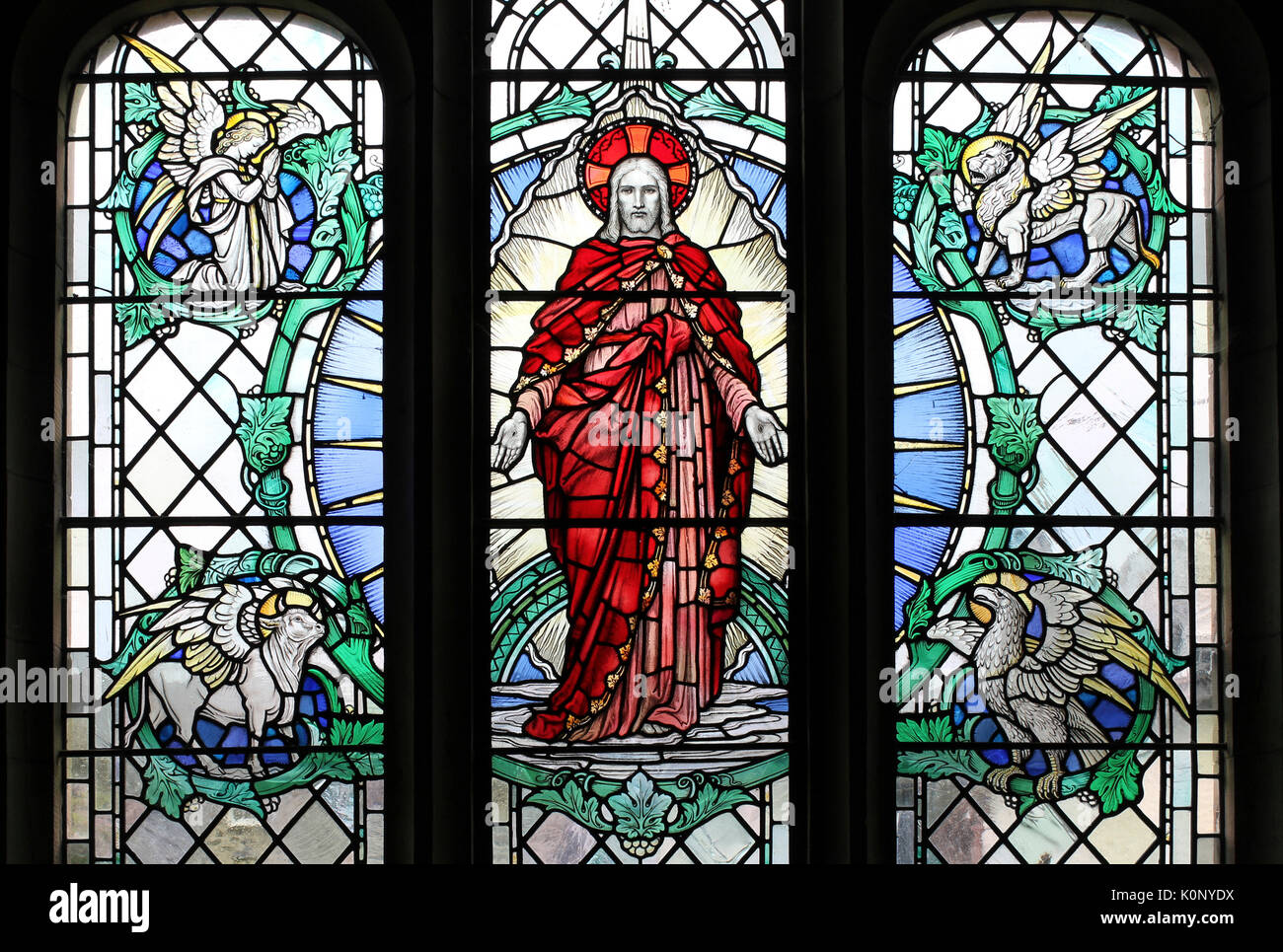 Stained Glass Window depicting Christ with Four Beasts of the Apocalypse Stock Photo