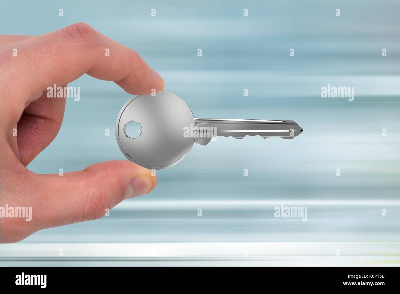 Digital composite of Hand holding keys Stock Photo