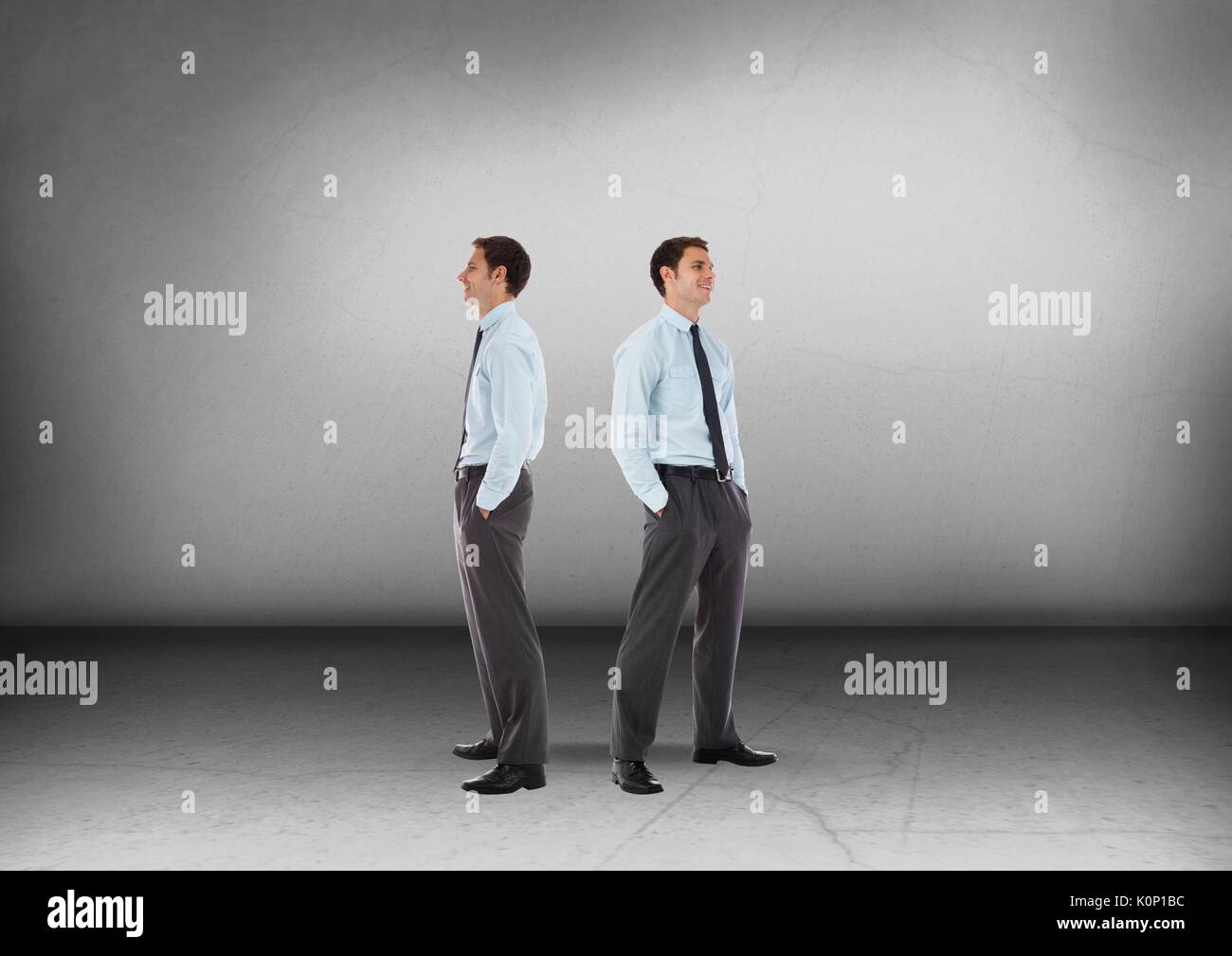 Digital composite of Businessman looking in opposite directions Stock