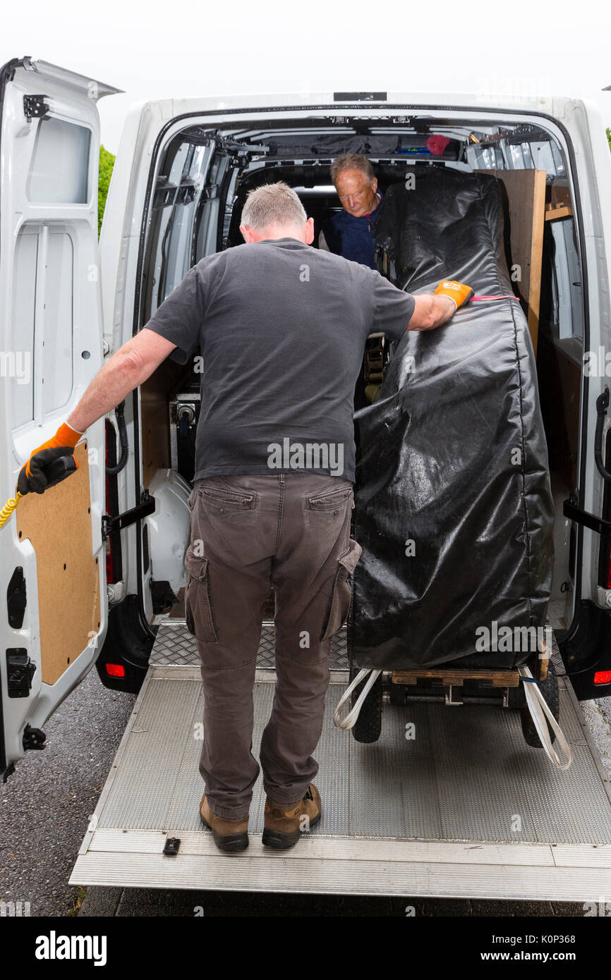 Steinway Grand Piano being moved into a church, Ireland Stock Photo