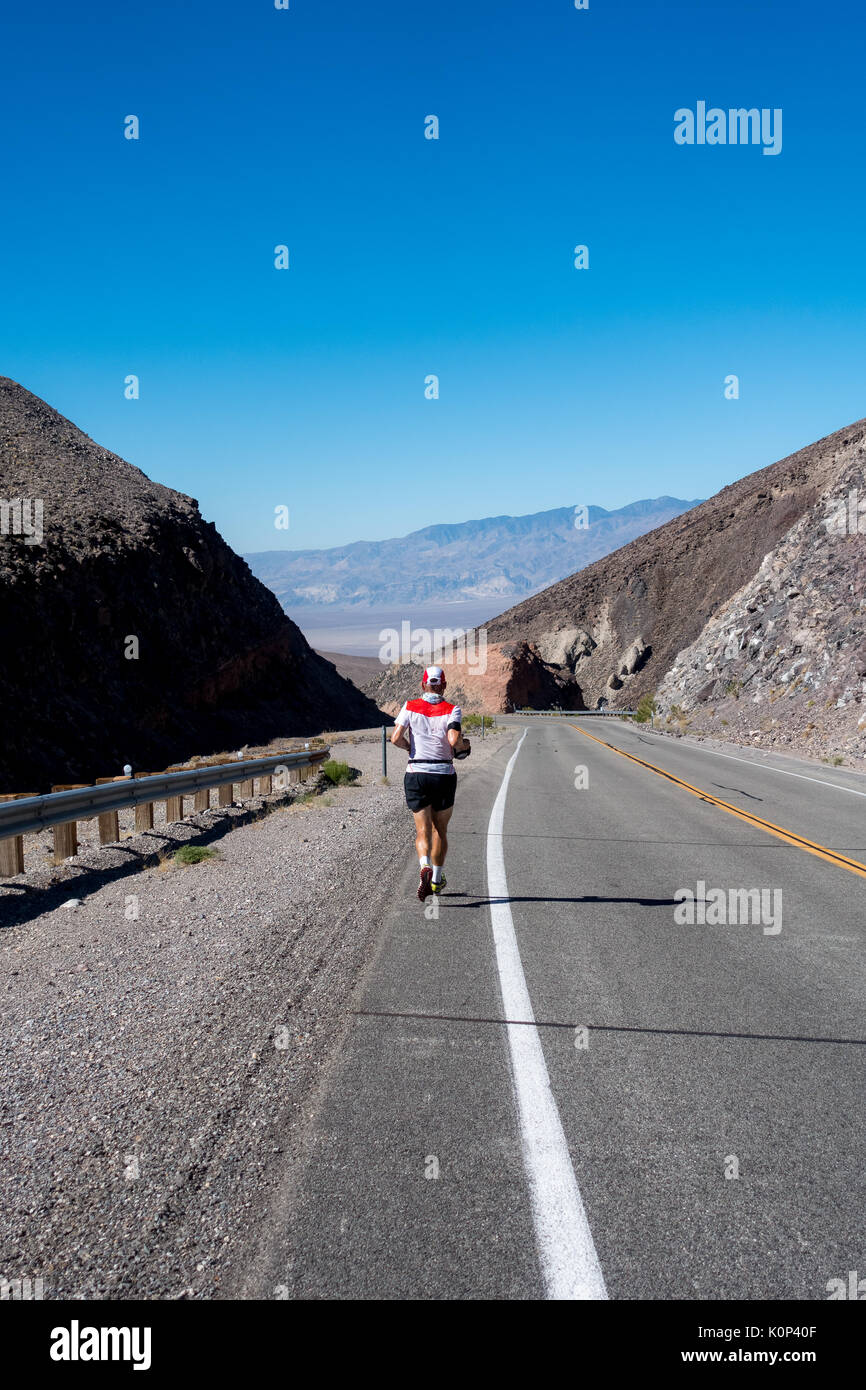 Lone runner in Death Valley, during Badwater, 135 miles ultramarathon