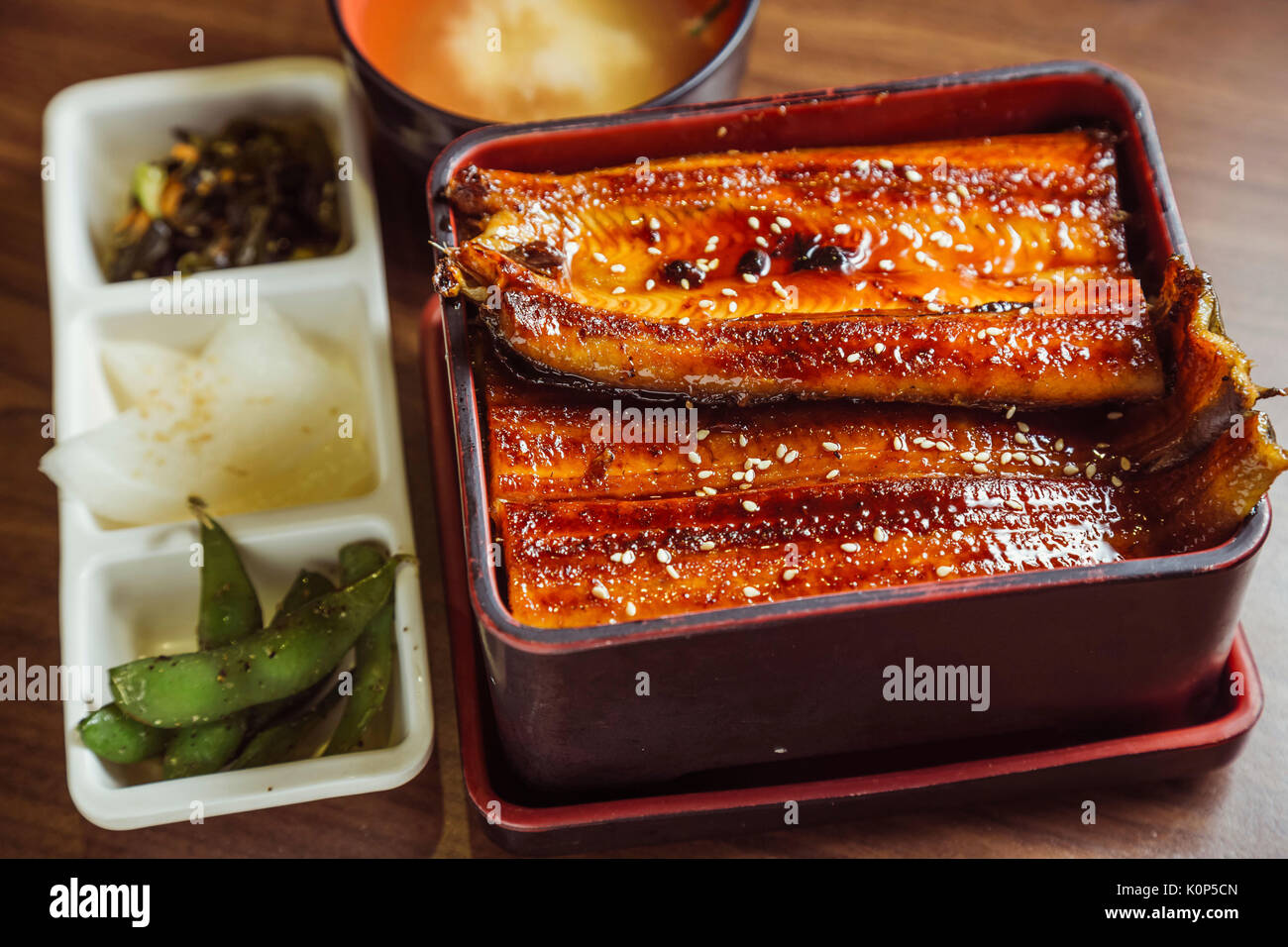 grilled eel over rice Stock Photo Alamy