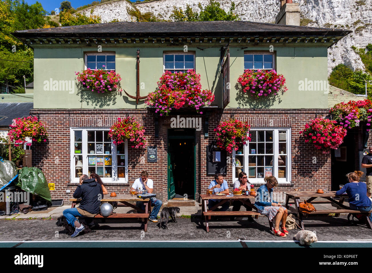 People Drinking and Socialising Outside The Snowdrop Pub, Lewes, East Sussex, UK Stock Photo