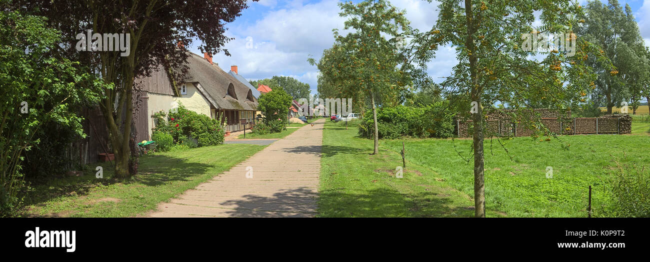 Street with various houses listed as monuments at Jager, Mecklenburg-Vorpommern, Germany. Stock Photo