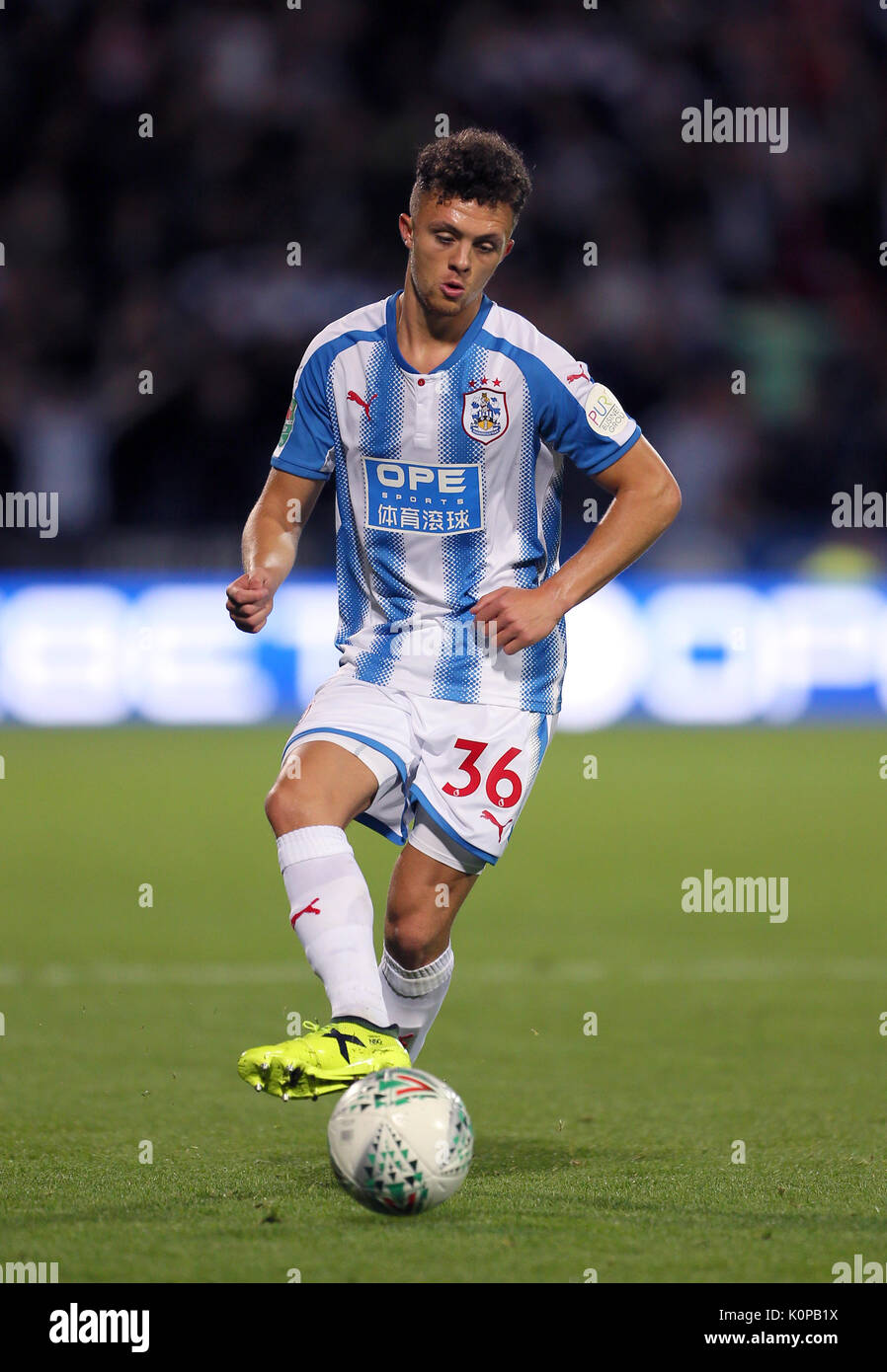 Huddersfield Town's Jordan Williams during the Carabao Cup, Second Round match at the John Smith's Stadium, Huddersfield. PRESS ASSOCIATION Photo. Picture date: Wednesday August 23, 2017. See PA story SOCCER Huddersfield. Photo credit should read: Richard Sellers/PA Wire. RESTRICTIONS: No use with unauthorised audio, video, data, fixture lists, club/league logos or 'live' services. Online in-match use limited to 75 images, no video emulation. No use in betting, games or single club/league/player publications. Stock Photo