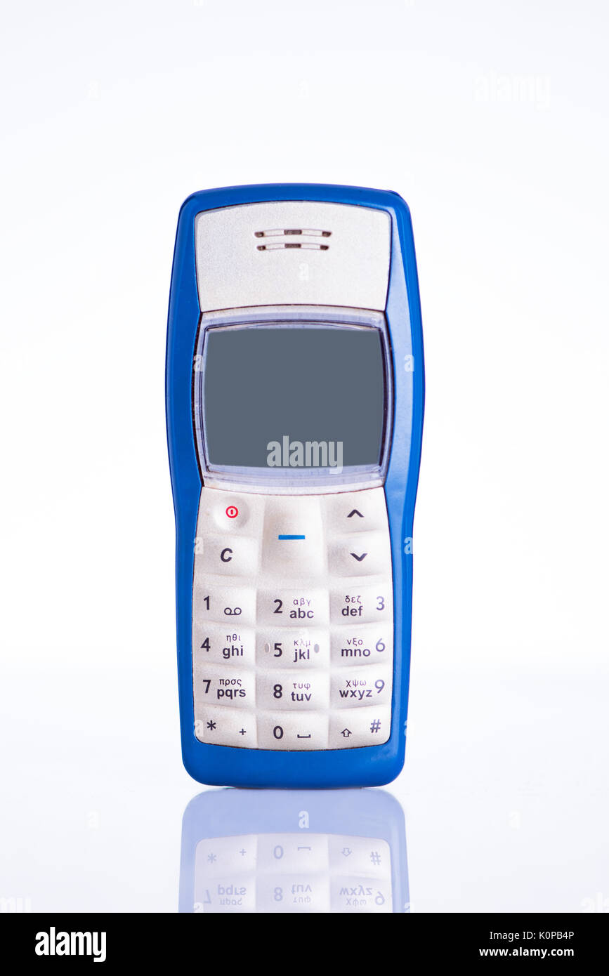 Retro mobile phone isolated on white background Stock Photo - Alamy