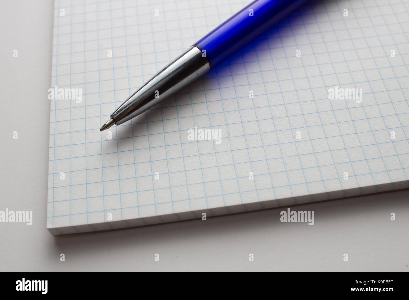 Empty notepad with a pen Stock Photo