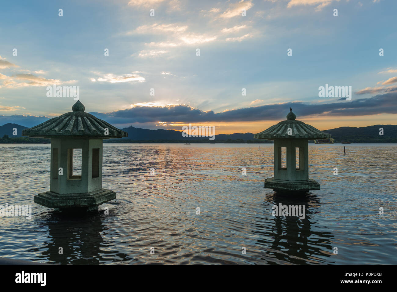 pagoda in the lake, hangzhou, stone lanterns, china evening twilights clouds Stock Photo