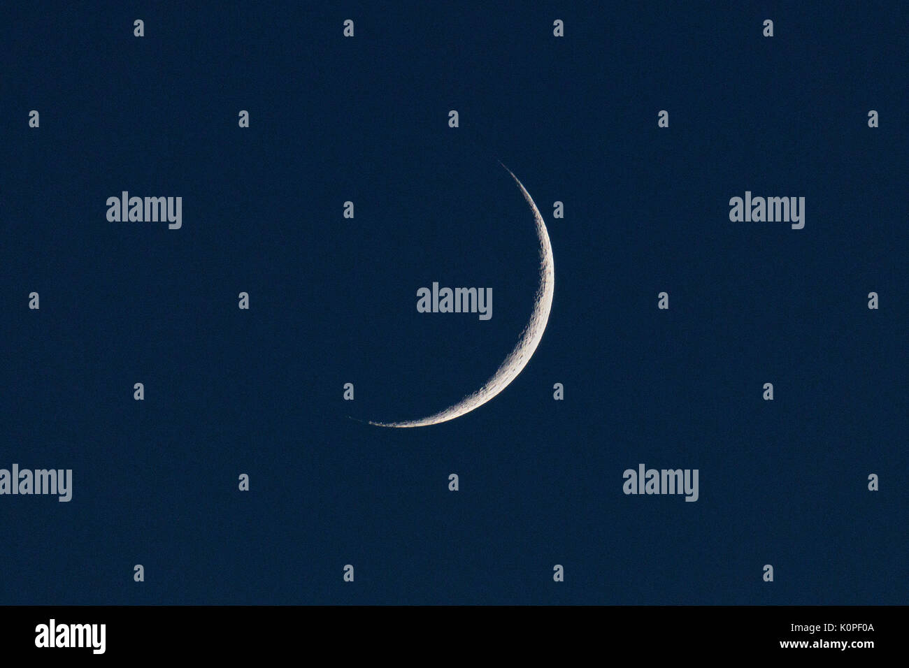 Burlington, Iowa, USA. 23rd August, 2017. Waxing crescent moon in the