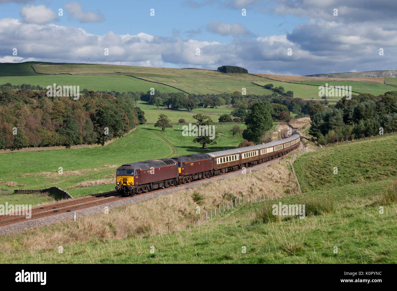 2 West coast railway Co class 57 locomotives pass  Eldroth (between Giggleswick & Clapham, Yorkshire) heading to  Carnforth steamtown with empty stock Stock Photo