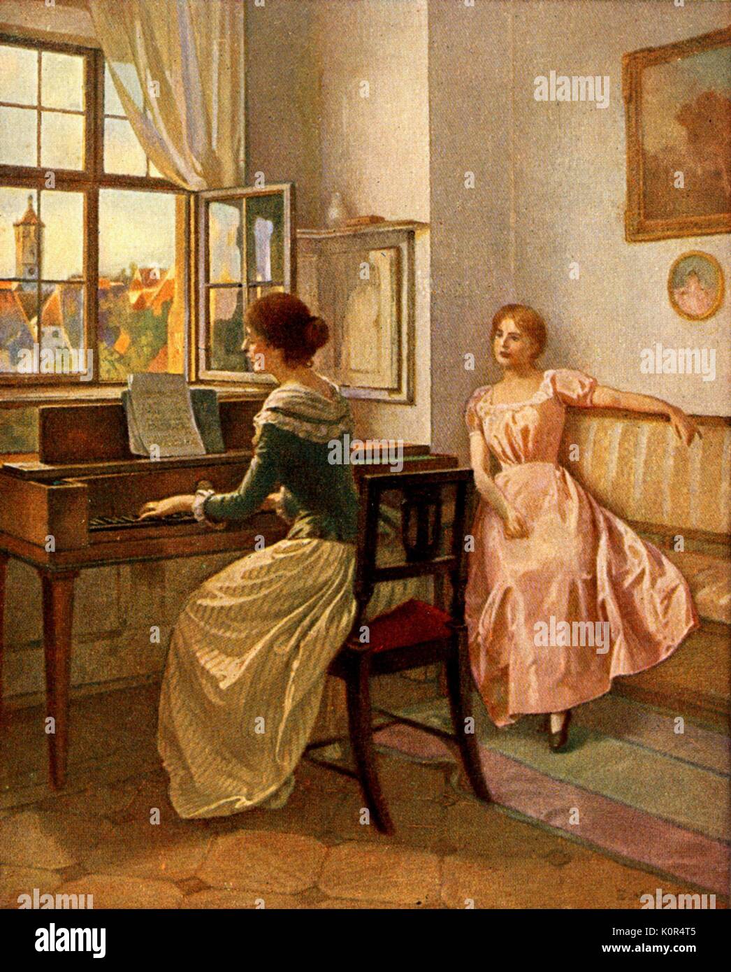 Friedliche Stunde (' Peaceful Hour ')  by Edouard Niczky. Two women playing and listening to piano. EN: 1850 - 1919 Stock Photo