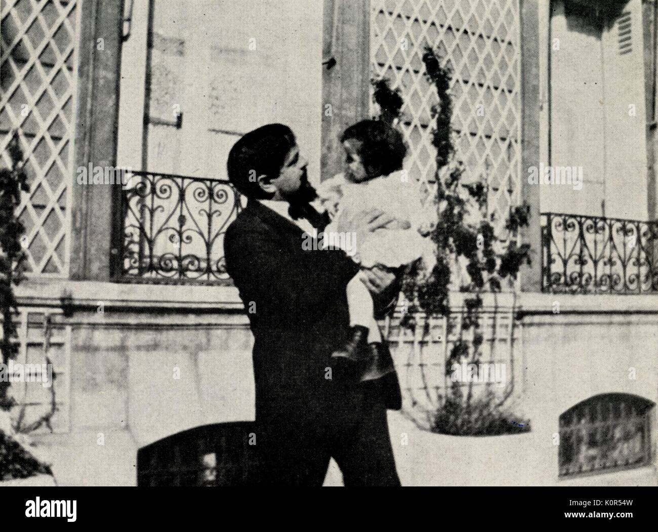 Claude Debussy carrying daughter Chouchou, 1909.  She died aged 14. French composer, 22 August 1862 - 25 March 1918. Stock Photo