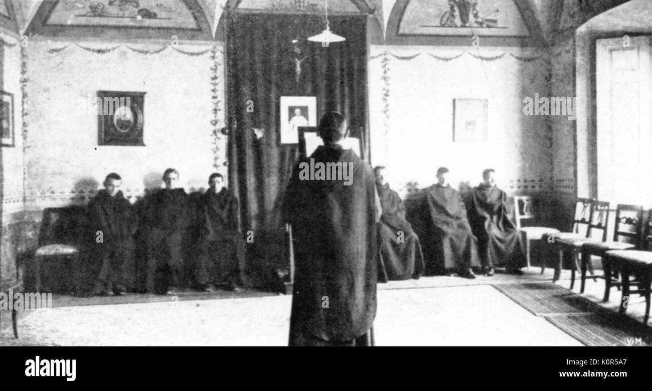 Benedictine monks rehearsing Gregorian chant, 1907 France. Rule of St Benedict. Stock Photo