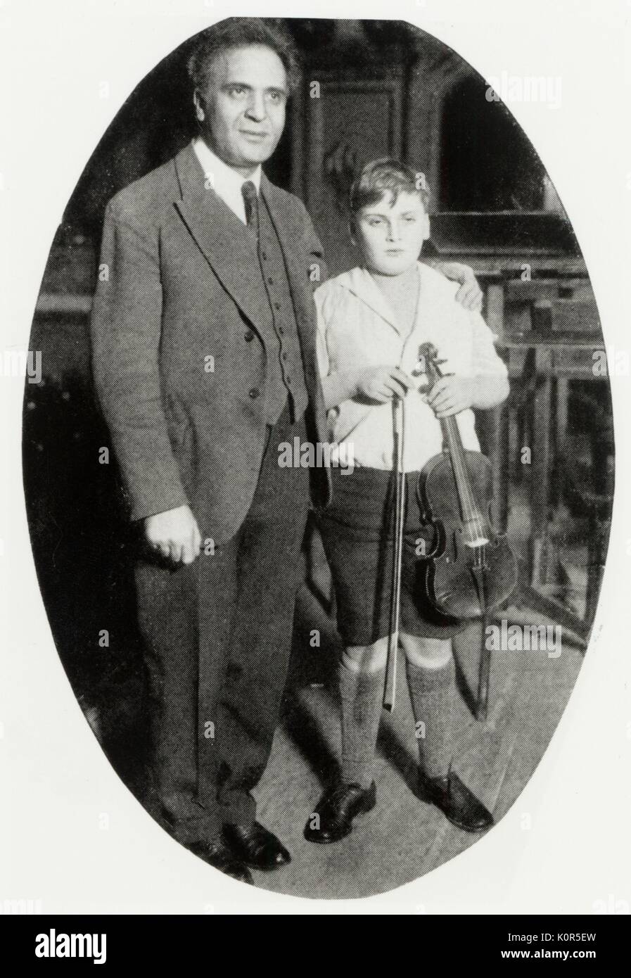 Bruno Walter with young Yehudi Menuhin and violin in 1929. BW: German conductor 1876 - 1962. YM: violinist 1916 - 1969. Stock Photo