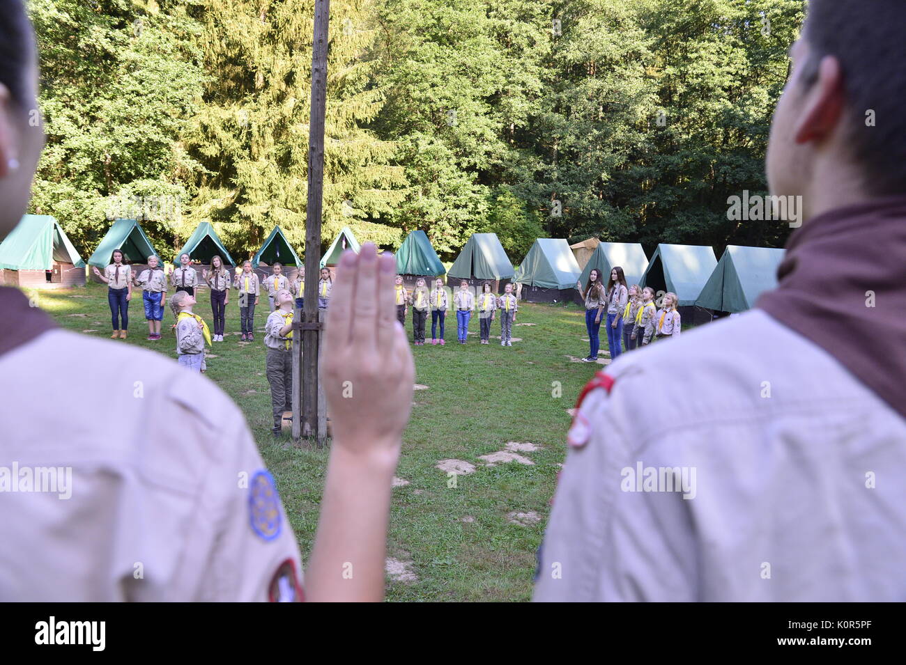 Czech boy and girl scouts during their summer camp. Czech scouts usually stay in tents for 2 or 3 weeks. August 10, 2017; Drahnovice in Czech republic Stock Photo