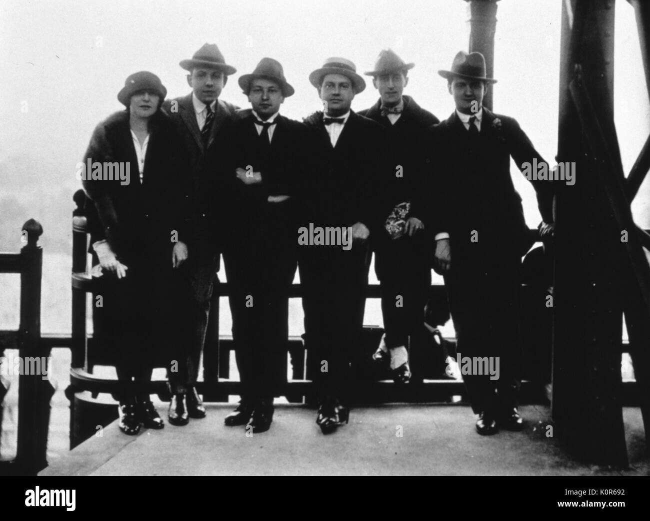 LES SIX at the Eiffel Tower in 1921 Tailleferre, Poulenc, Honegger, Milhaud, Cocteau, Auric. Stock Photo