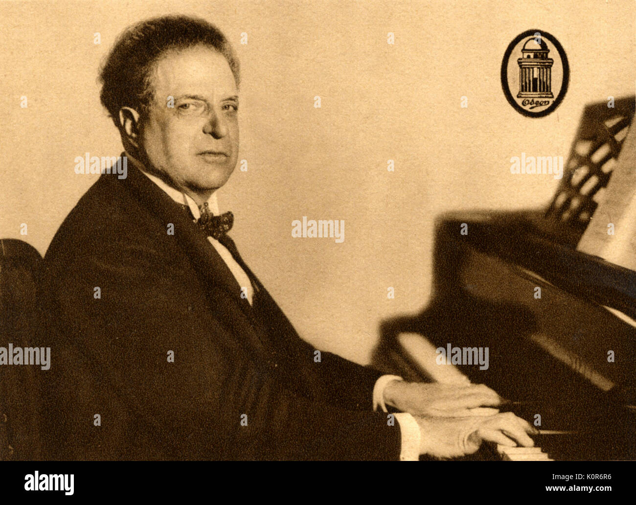 Pietro Mascagni at the piano. Italian composer (1863-1945) Stock Photo