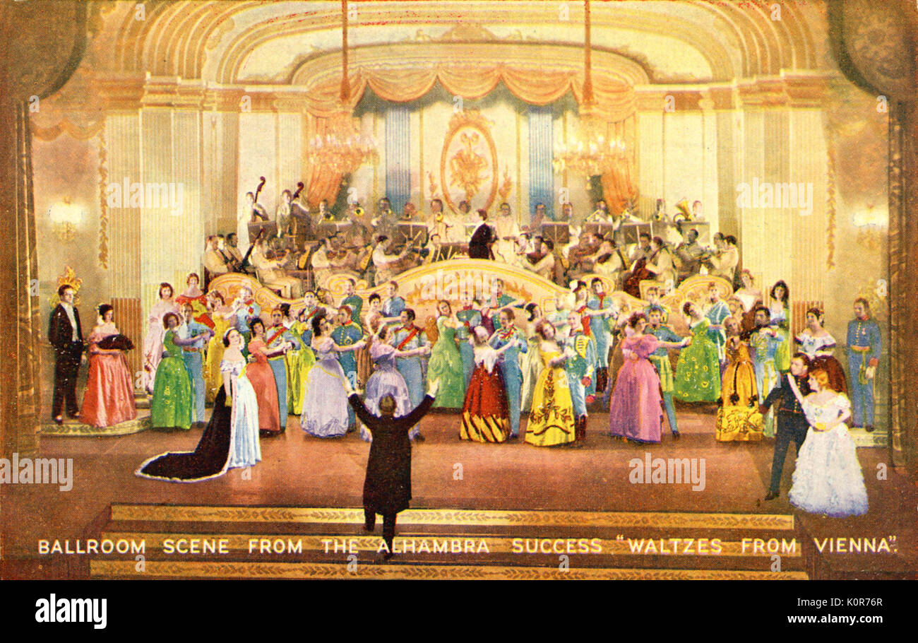 Ballroom scene from 'Waltzes from Vienna'.  Conductor leading the singers in the opera, performing on stage. Stock Photo
